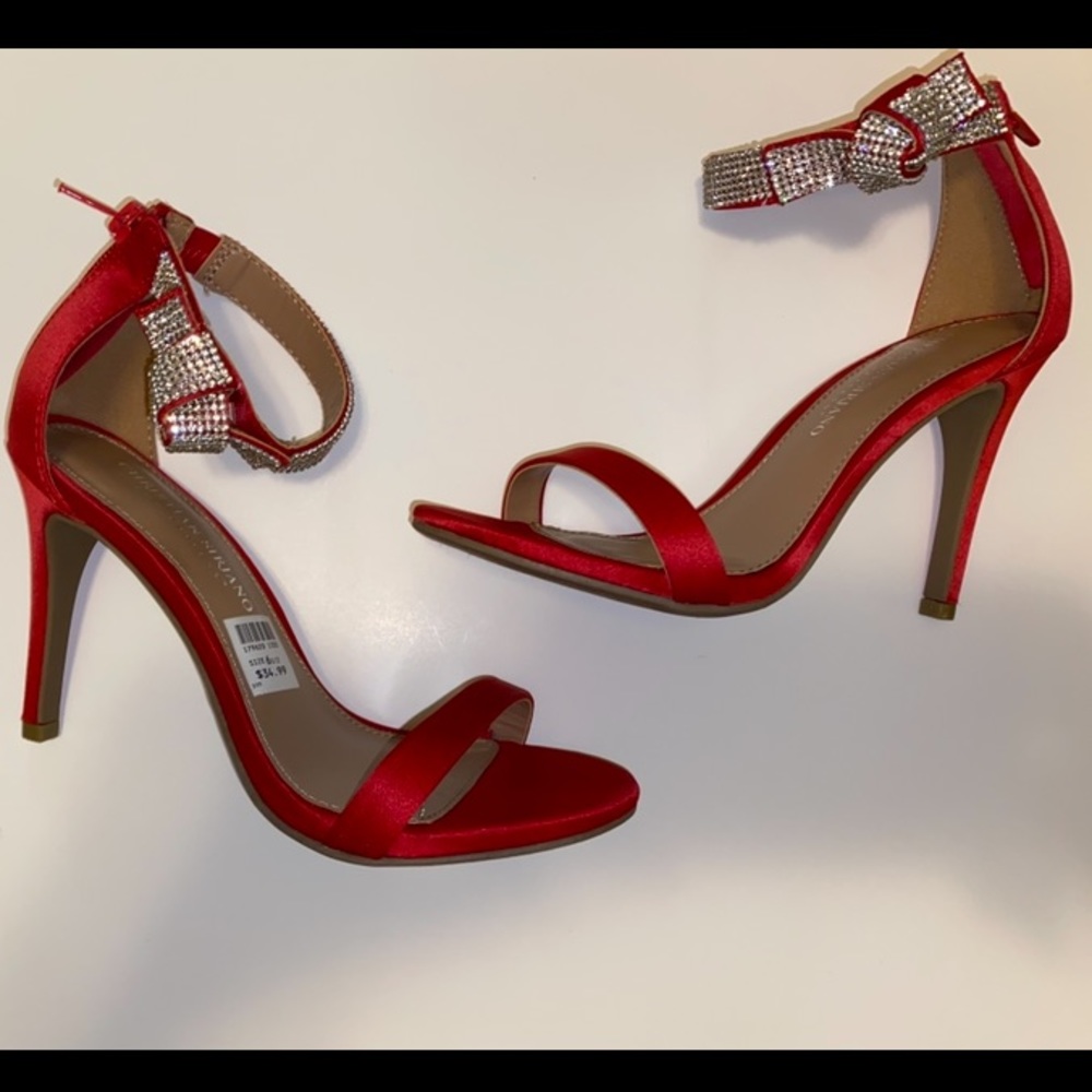 Red high heels with silver diamond ankle straps